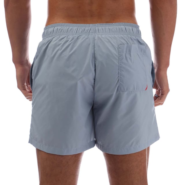 Mens Hugo Haiti Contrast Logo Swim Shorts in blue.- Elastic waistband with drawstring.- Side pockets.- Back pocket.- Quick-dry material.- 100% Polyamide.- Ref: 50469312483