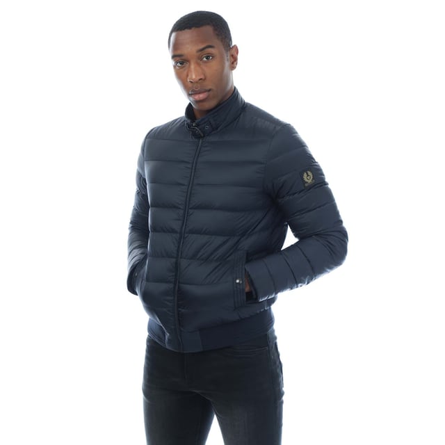 Mens Belstaff Circuit Jacket in dark ink.- Stand collar with adjustable throat latch.- Centre front zip closure.- Elasticated inner cuffs.- Rib at hem with racked stitch detailing.- Belstaff phoenix patch on left sleeve.- Two multi-stitch side pockets and one inside pocket with press-stud closures.- High-density  water-repellent nylon fabric.- High warmth to weight ratio.- Lightweight and compressible.- 750 fill power down.- 100% RDS certified down and feather.- Shell: 100% polyamide  Lining: 100% polyamide.  Filling: 90% white duck down  10% white duck feather.  Rib: 90% cotton  8% polyester  2% elastane.  Machine washable.- Ref: 105293DKINK