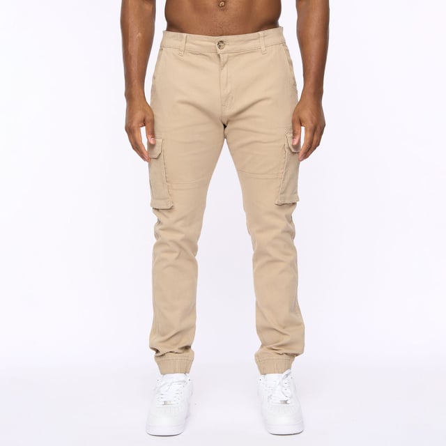 Presenting our men's straight cargo pants  featuring a top button fastening and scooped front pocket mouths for added convenience. These pants also include button-fastened cargo pockets and hidden button-fastened back pocket flaps for secure storage. Complete with a back waist leather patch.