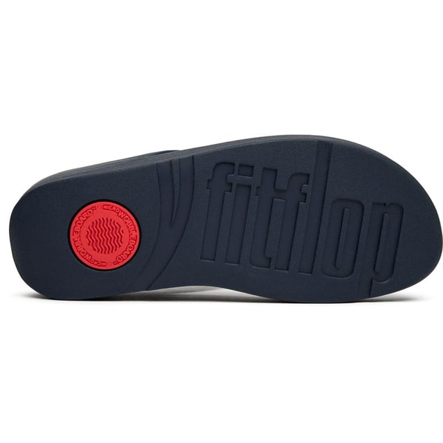 Blauwe Fitflop fino sandalen voor dames, gemaakt van synthetisch materiaal en een rubberen zool. Kenmerken: detail aan de voorkant, micro-wobbleboardzool en lichtgewicht.