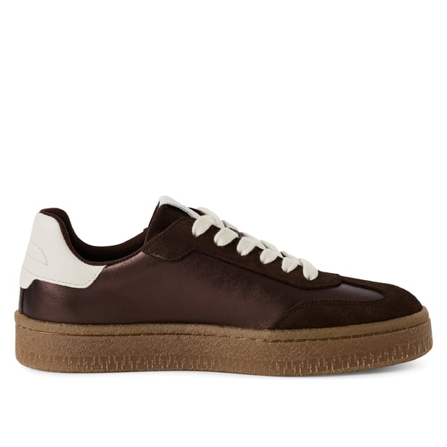 Add a touch of luxury to your everyday style with these fashion-forward sneakers from Tamaris. Crafted from a premium mix of soft suede leather, these lace-up trainers feature stripes for added style. The sporty silhouette is elevated with a clean, modern finish, making them perfect for both casual days and chic urban outings.

Upper Material: High-quality mix of suede leather and textile
Lining & Insole: Soft textile for all-day comfort
Outsole: Grippy synthetic sole for confident steps
Heel Type & Height: No heel, with a 30 mm sole for subtle elevation
Shaft Height: 6.5 cm
Shoe Type: Women’s lace-up sneakers