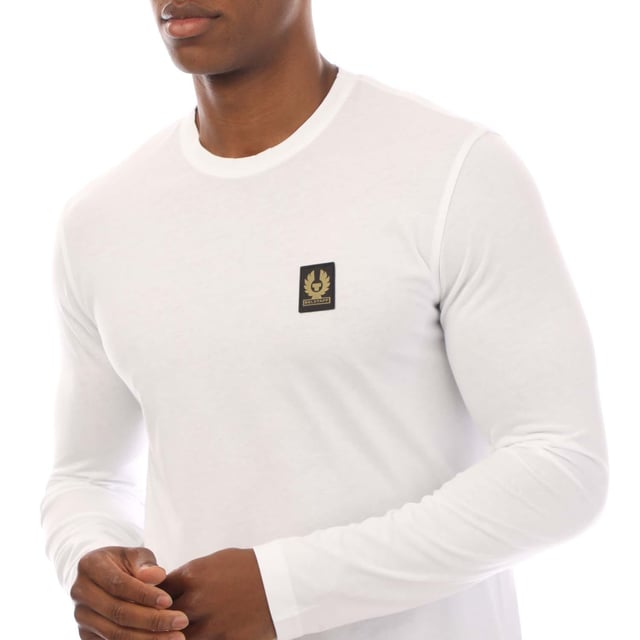 Mens Belstaff Cotton Jersey Long Sleeve T-Shirt in white.- Crew neck.- Long sleeves.- Belstaff logo patch at left chest.- Soft  lightweight cotton jersey.- Slim fit.- 100% Cotton. Machine washable.- Ref: 100054WHITE