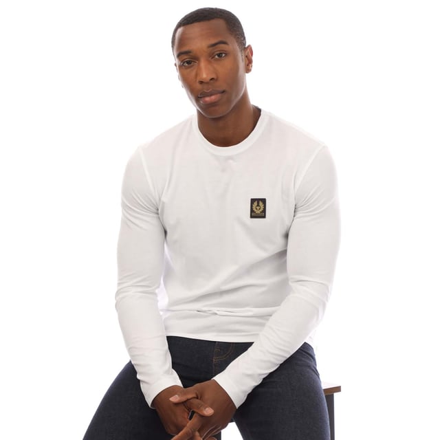 Mens Belstaff Cotton Jersey Long Sleeve T-Shirt in white.- Crew neck.- Long sleeves.- Belstaff logo patch at left chest.- Soft  lightweight cotton jersey.- Slim fit.- 100% Cotton. Machine washable.- Ref: 100054WHITE