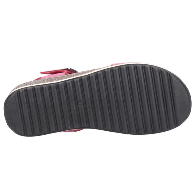 Hush Puppies Womens/Ladies Ellie Leather Wedge Sandals (Pink) Upper: Leather, Soft. Lining: Leather, Soft. Insole: Cushioned, Padded. Outsole: Flexible, Hardwearing, Lightweight, PU (Polyurethane). Breathable. Low Wedge. Heel Height: 35mm. Design: Logo, Plain. Fastening: Buckle.