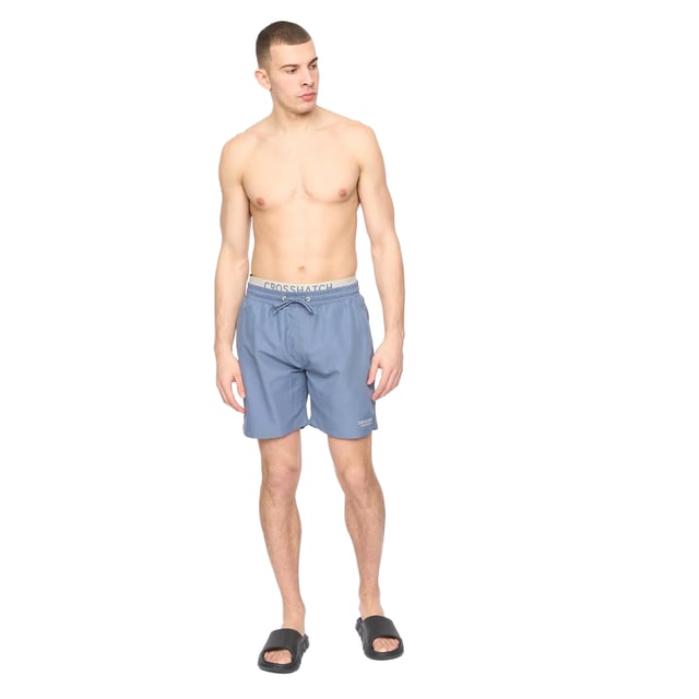 100% Polyester. Design: Logo. Pockets: 2 Side Pockets, 1 Back Pocket. Fastening: Pull-On. Metal Eyelets. Waistline: Adjustable, Branded, Drawstring.