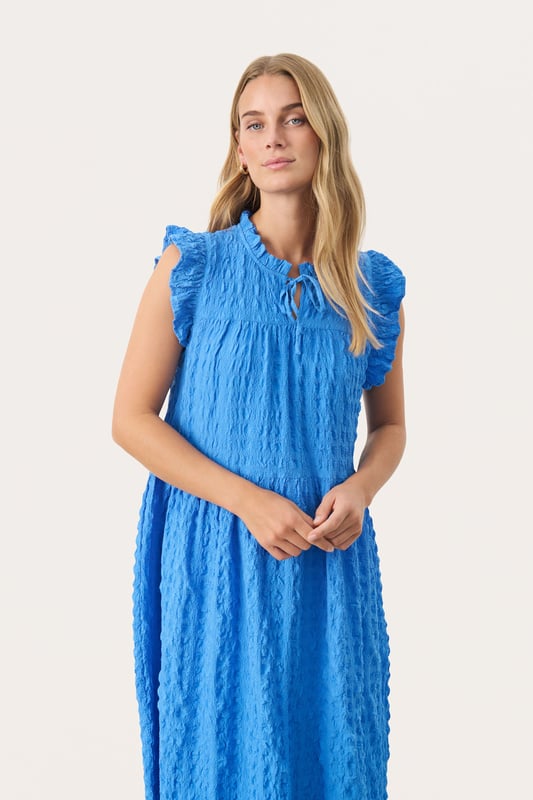 Regular fit,Midi lengte  Fijne was 30°, niet bleken, niet in de droger drogen, Druipnat ophangen in de schaduw, warm strijken max. 150° C, Niet droog reinigen  95% Polyester (Gerecycled),5% Elastaan