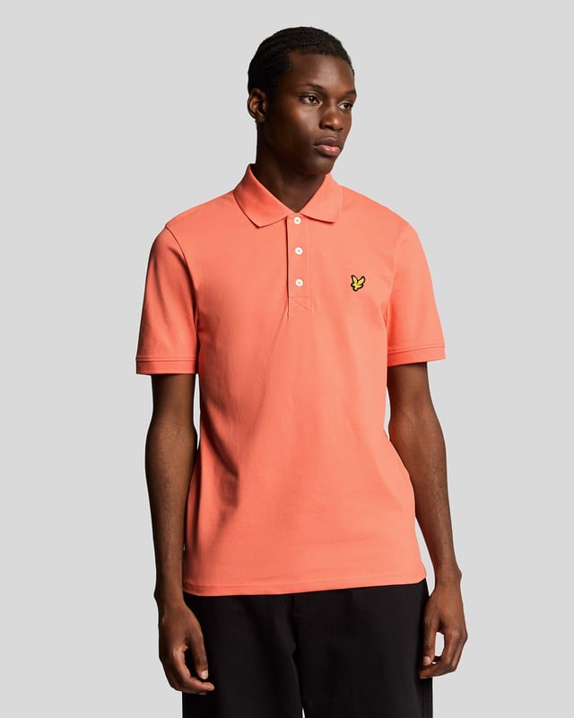 It’s a wardrobe essential that will be pulled out on weekends, dress down days at work, for nights out and even for days on the golf course. Our plain Lyle & Scott polo shirt is such a classic that it barely needs an introduction. It’s made from cotton-blend jersey with a little added stretch. - Classic collar 
- Front button fastening 
- Short sleeves
- Composition: 97% cotton, 3% elastane