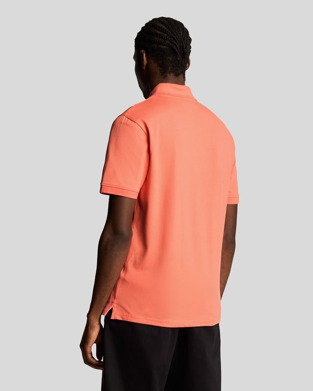 It’s a wardrobe essential that will be pulled out on weekends, dress down days at work, for nights out and even for days on the golf course. Our plain Lyle & Scott polo shirt is such a classic that it barely needs an introduction. It’s made from cotton-blend jersey with a little added stretch. - Classic collar 
- Front button fastening 
- Short sleeves
- Composition: 97% cotton, 3% elastane