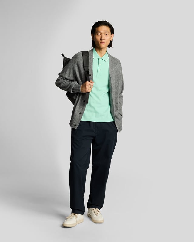 When people think of Lyle & Scott, they often think of polo shirts, so it stands to reason that we create the best polo shirts season after season. This one is cut for a classic fit in cotton jersey with a bit of added stretch and is finished with contrast tipping at the collar and cuffs for a slightly preppy look. - Classic collar 
- Front button fastening 
- Short sleeves 
- Tipped collar and cuffs
- Composition: 97% cotton, 3% elastane