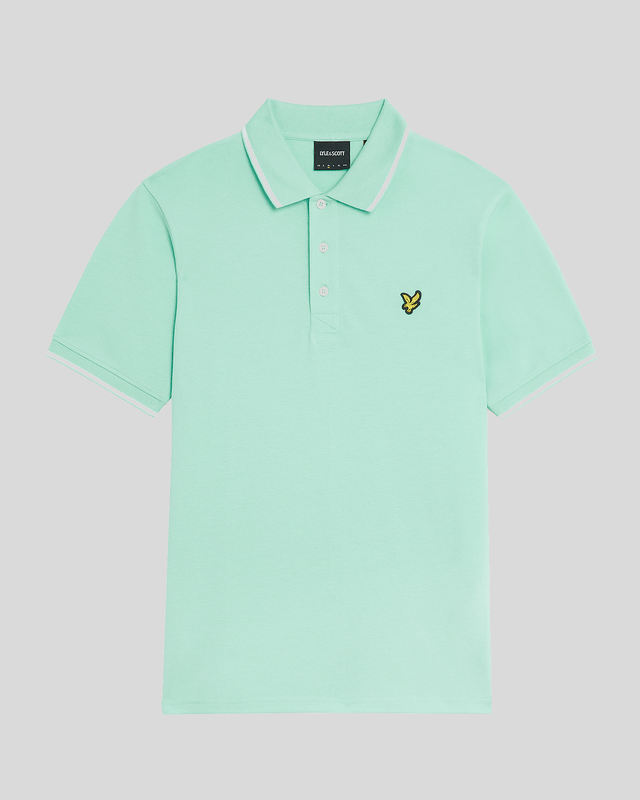 When people think of Lyle & Scott, they often think of polo shirts, so it stands to reason that we create the best polo shirts season after season. This one is cut for a classic fit in cotton jersey with a bit of added stretch and is finished with contrast tipping at the collar and cuffs for a slightly preppy look. - Classic collar 
- Front button fastening 
- Short sleeves 
- Tipped collar and cuffs
- Composition: 97% cotton, 3% elastane