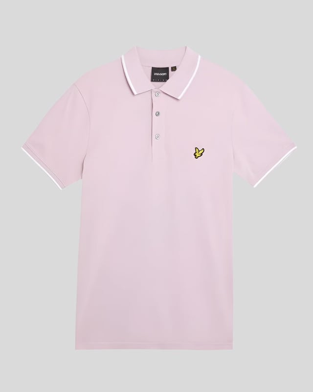 When people think of Lyle & Scott, they often think of polo shirts, so it stands to reason that we create the best polo shirts season after season. This one is cut for a classic fit in cotton jersey with a bit of added stretch and is finished with contrast tipping at the collar and cuffs for a slightly preppy look. - Classic collar 
- Front button fastening 
- Short sleeves 
- Tipped collar and cuffs
- Composition: 97% cotton, 3% elastane