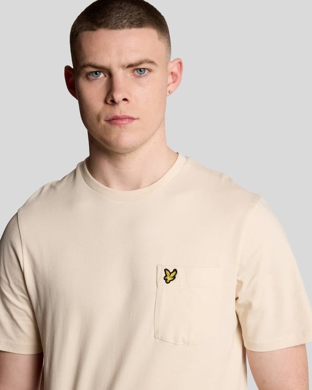 The Lyle & Scott Pocket T-shirt is our classic 100% BCI cotton tee with an added breast pocket. It's simplicity itself.- White- 100% BCI cotton- 190 gsm single jersey fabric- Set-in sleeves- Stitched sleeves and hem- Superior cut