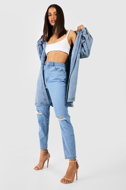 A classic go-to silhouette made from rigid and durable denim, the mom jean has become a wardrobe essential for every girl. Whether you're styling them day to day or wearing on a night out with heels, we have mom jeans to suit your vibe. Our ripped mom jeans let you get daring, just try a bum rip or a simple busted knee to serve everyday attitude. Step out in high waisted mom jeans for a low-key look that stays fresh all season. This is no regular denim staple - it's over to you to create the look.Style: Mom JeansFabric: Denim