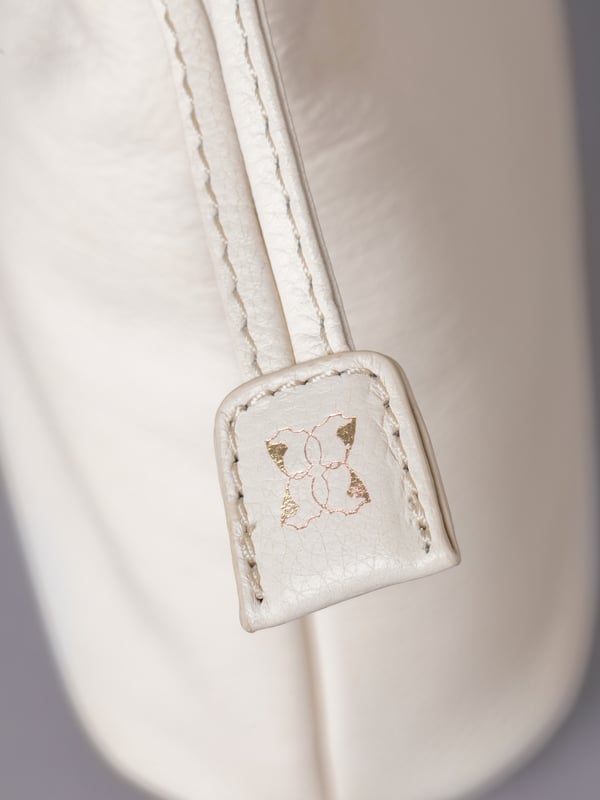 The Eskrigg Leather Drawstring Cross Body Bag combines contemporary style with compact practicality, making it the perfect everyday companion.
Crafted from luxurious real leather, this bag is designed for hands-free convenience with an adjustable cross-body strap for a tailored fit. The elegant drawstring closure, enhanced by a magnetic dot fastening, adds a touch of modern charm while keeping your essentials secure.
Inside, a fabric lining, zip pocket, and slip pocket provide thoughtful organization for smaller items. Compact yet versatile, this stylish cross-body bag is a sleek addition to the Eskrigg collection.