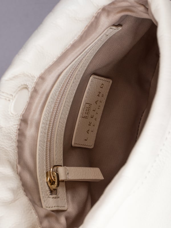 The Eskrigg Leather Drawstring Cross Body Bag combines contemporary style with compact practicality, making it the perfect everyday companion.
Crafted from luxurious real leather, this bag is designed for hands-free convenience with an adjustable cross-body strap for a tailored fit. The elegant drawstring closure, enhanced by a magnetic dot fastening, adds a touch of modern charm while keeping your essentials secure.
Inside, a fabric lining, zip pocket, and slip pocket provide thoughtful organization for smaller items. Compact yet versatile, this stylish cross-body bag is a sleek addition to the Eskrigg collection.