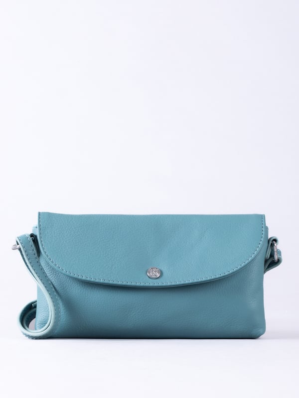Streamlined, stylish, and just the right size, the Tawns bag is your go-to for those essentials you can&rsquo;t leave home without.
Compact yet practical, this mini cross body bag is perfectly sized for your phone, keys, and other small must-haves. Crafted from real leather for a touch of understated luxury, it features a secure flapover press-stud fastening and an adjustable strap for the perfect fit.
With a soft fabric lining to protect your items, the Tawns is as functional as it is effortlessly chic.