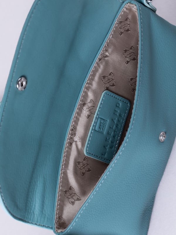 Streamlined, stylish, and just the right size, the Tawns bag is your go-to for those essentials you can&rsquo;t leave home without.
Compact yet practical, this mini cross body bag is perfectly sized for your phone, keys, and other small must-haves. Crafted from real leather for a touch of understated luxury, it features a secure flapover press-stud fastening and an adjustable strap for the perfect fit.
With a soft fabric lining to protect your items, the Tawns is as functional as it is effortlessly chic.