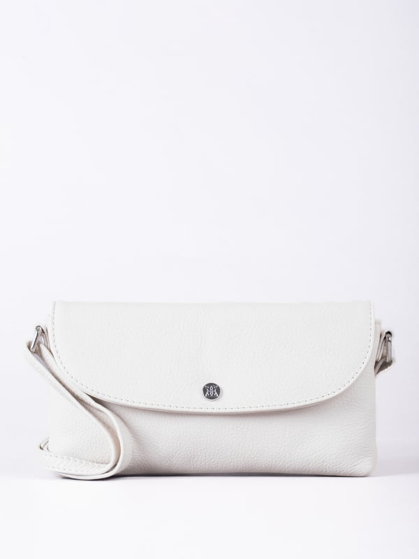 Streamlined, stylish, and just the right size, the Tawns bag is your go-to for those essentials you can&rsquo;t leave home without.
Compact yet practical, this mini cross-body bag is perfectly sized for your phone, keys, and other small must-haves. Crafted from real leather for a touch of understated luxury, it features a secure flapover press-stud fastening and an adjustable strap for the perfect fit.
With a soft fabric lining to protect your items, the Tawns is as functional as it is effortlessly chic.