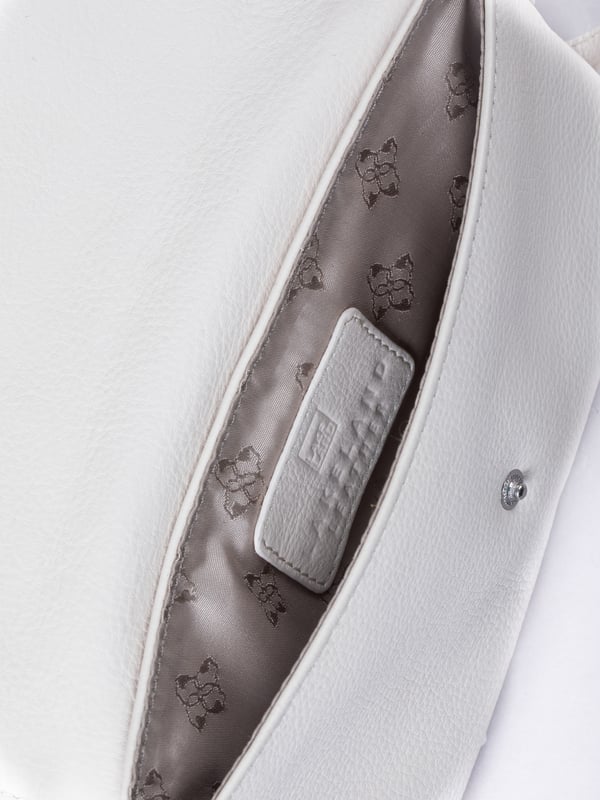 Streamlined, stylish, and just the right size, the Tawns bag is your go-to for those essentials you can&rsquo;t leave home without.
Compact yet practical, this mini cross-body bag is perfectly sized for your phone, keys, and other small must-haves. Crafted from real leather for a touch of understated luxury, it features a secure flapover press-stud fastening and an adjustable strap for the perfect fit.
With a soft fabric lining to protect your items, the Tawns is as functional as it is effortlessly chic.
