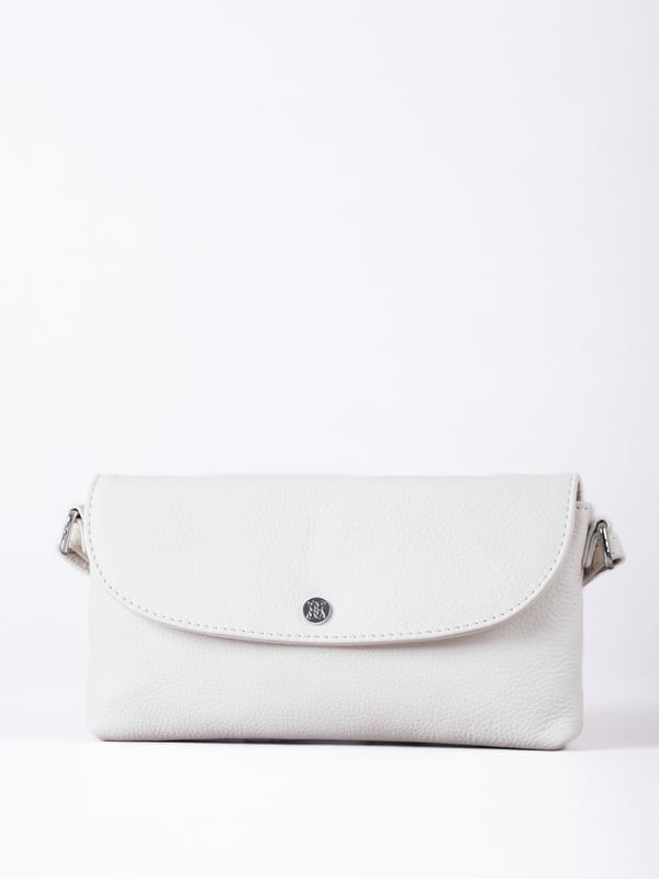 Streamlined, stylish, and just the right size, the Tawns bag is your go-to for those essentials you can&rsquo;t leave home without.
Compact yet practical, this mini cross-body bag is perfectly sized for your phone, keys, and other small must-haves. Crafted from real leather for a touch of understated luxury, it features a secure flapover press-stud fastening and an adjustable strap for the perfect fit.
With a soft fabric lining to protect your items, the Tawns is as functional as it is effortlessly chic.