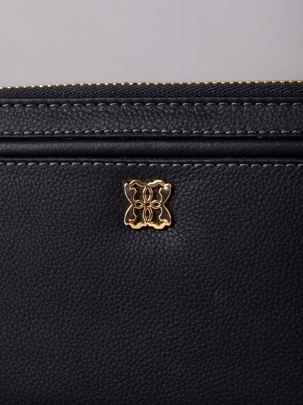 This large purse with handy zip around fastening is a must-have handbag accessory this season and beyond. Crafted from smooth leather, this purse contains ample storage for all your spending essentials including plenty of card slots, slip pockets and a zipped coin pocket. Finished with RFID protection to keep your cards electronically secure.