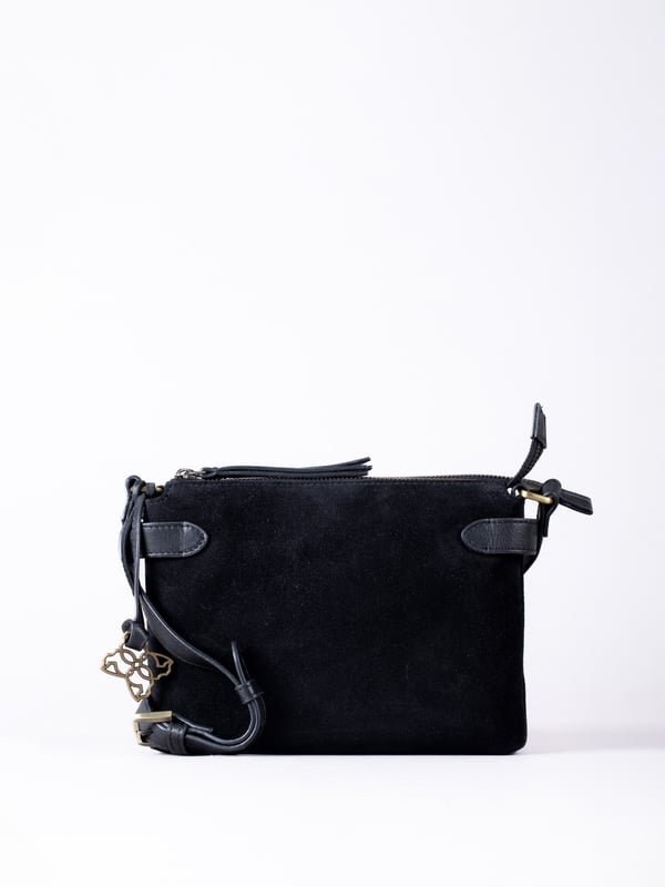 The Bridge twin cross body bag combines timeless style with practical design, making it a must-have for any wardrobe. Expertly crafted from real leather and suede, this versatile bag features a striking front suede compartment for added texture and interest. It also features an adjustable cross-body strap, offering a comfortable and customizable fit for hands-free wear.
With twin zip compartments &mdash; one smooth leather and one soft suede &mdash; there&rsquo;s ample space to keep essentials organized, while the interior slip pocket ensures smaller items stay secure. Finished with a ribbed fabric lining and available in three elegant colours, the Bridge bag is your go-to accessory for refined everyday style.