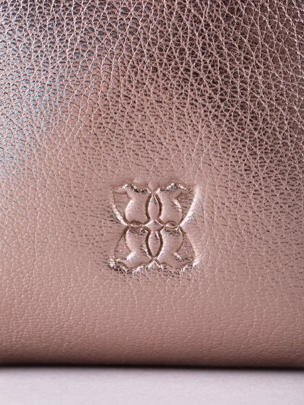 Small in size, big on style - the Tarnly phone pouch is the perfect hands-free companion for life on the move. Crafted from real leather with a soft satin lining, this compact cross-body features a flapover design secured with a magnetic press-stud fastening and finished with a decorative front buckle detail. Side stitch accents add a subtle crafted touch, while a rear zip pocket offers easy access to essentials. With an adjustable strap for the perfect fit, Tarnly keeps your phone and small valuables close in effortless style.