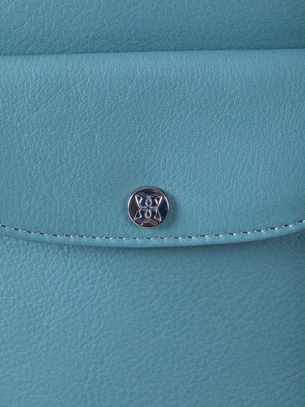 The Tirrill cross body bag combines timeless design with practical functionality. Made from real leather, it&rsquo;s a versatile addition to your wardrobe, ideal for both day-to-day wear and special outings.
The adjustable cross-body strap allows for a customizable fit, while the flapover press-stud front pocket keeps your essentials close at hand. Inside, you'll find zip and slip pockets, perfect for organizing your belongings, all finished with a fabric lining for added refinement.
The Tirrill bag is compact yet spacious enough for all your daily must-haves, making it the perfect portable companion.