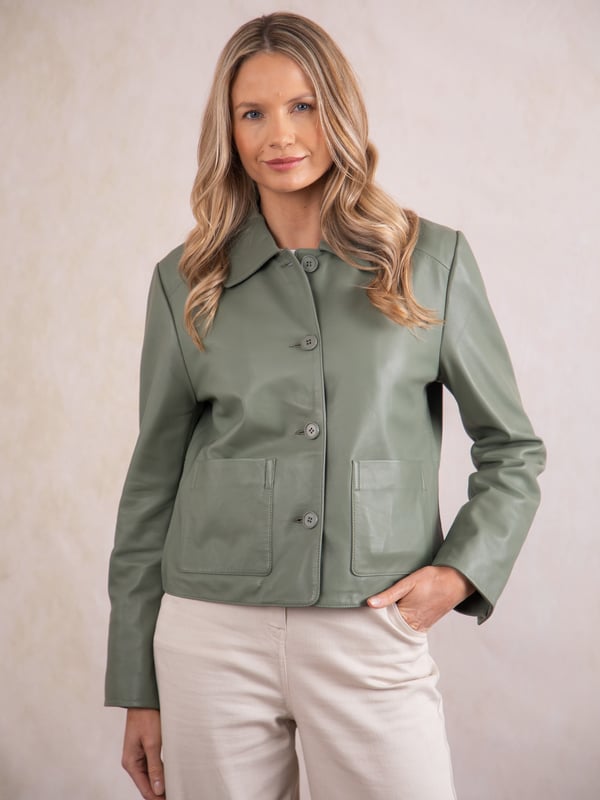 Kendal Collared Leather Jacket in Sage Green The minimally styled Kendal leather jacket will add understated elegance to all your outfits. Crafted from real leather in a boxy fit, this collared jacket features tonal buttons and large patch pockets for a unique look. Wear it buttoned up with your favourite trousers or open over a dress, the options are endless.