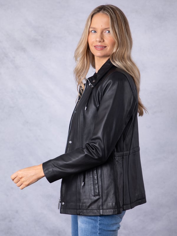 Levens Leather Field Jacket in Black The Levens field jacket, crafted in sumptuously soft UK-sourced black leather, is designed to protect you from the elements and keep you looking stylish.This jacket features a funnel neck drawstring collar and front pockets, as well as a drawstring waist so it can be worn cinched in or left loose. Its longer length and centre zip fastening with added front placket provides added protection from the great British weather, and equally serves to flatter your form.