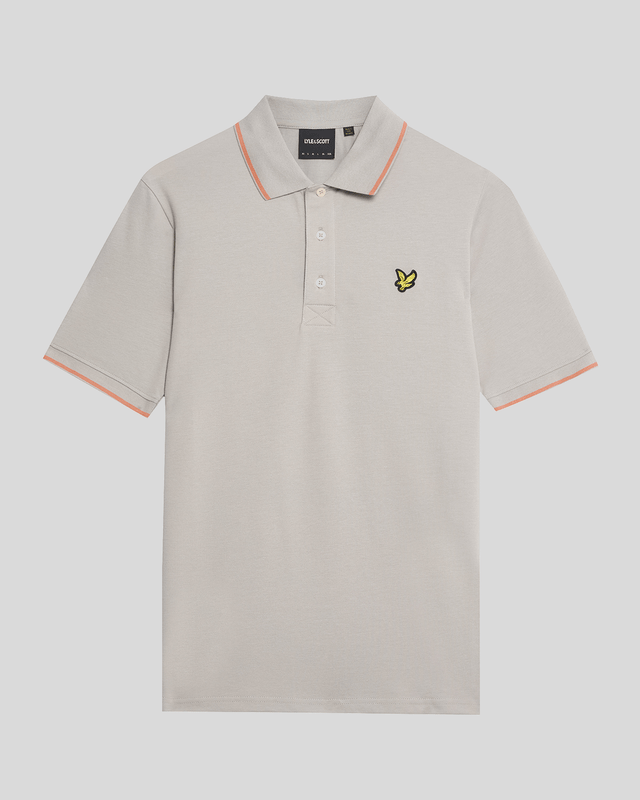 When people think of Lyle & Scott, they often think of polo shirts, so it stands to reason that we create the best polo shirts season after season. This one is cut for a classic fit in cotton jersey with a bit of added stretch and is finished with contrast tipping at the collar and cuffs for a slightly preppy look. - Classic collar 
- Front button fastening 
- Short sleeves 
- Tipped collar and cuffs
- Composition: 97% cotton, 3% elastane