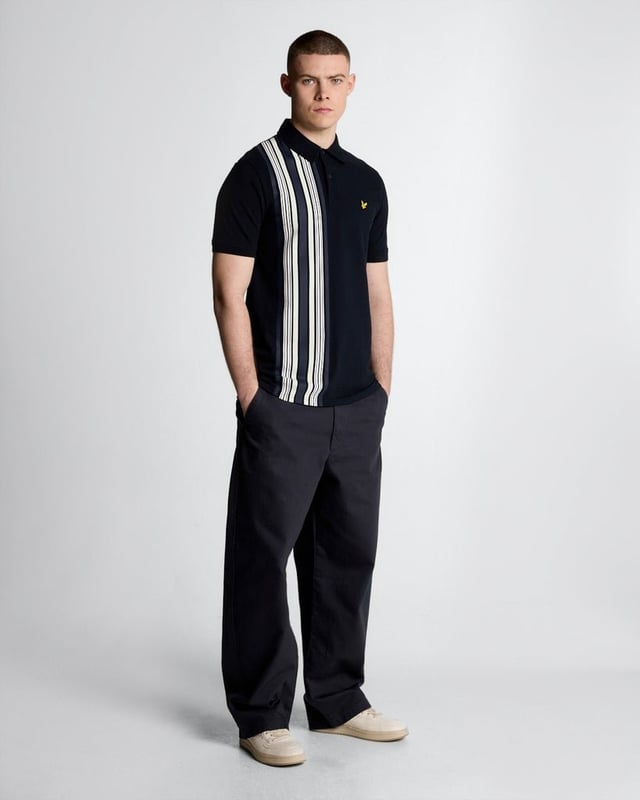 Introducing the Deck Stripe Polo Shirt from the Legacy collection, a quintessential addition to any discerning gentleman's wardrobe. This short-sleeved polo epitomizes sophistication and comfort, featuring a refined striped design that seamlessly fuses classic elegance with contemporary flair, making it an ideal choice for both casual and semi-formal occasions.

- Composition: 97% Cotton, 3% Elastane for luxurious softness and stretch
- Fit: Regular, tailored for a refined silhouette
- Logo Branding: Subtle branding reflecting understated luxury
- Garment Location: Discreetly placed for a sophisticated appeal

Elevate your spring menswear collection with this versatile piece, perfectly aligning with modern sophistication.