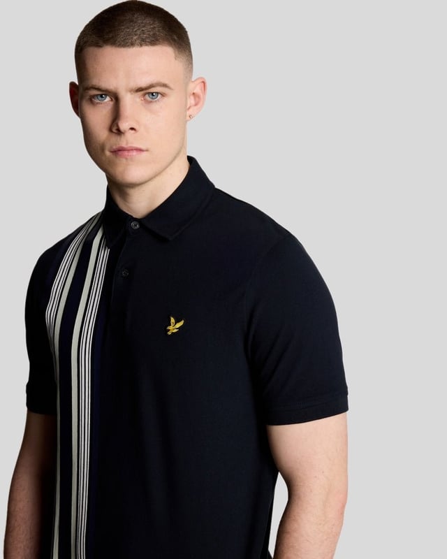 Introducing the Deck Stripe Polo Shirt from the Legacy collection, a quintessential addition to any discerning gentleman's wardrobe. This short-sleeved polo epitomizes sophistication and comfort, featuring a refined striped design that seamlessly fuses classic elegance with contemporary flair, making it an ideal choice for both casual and semi-formal occasions.

- Composition: 97% Cotton, 3% Elastane for luxurious softness and stretch
- Fit: Regular, tailored for a refined silhouette
- Logo Branding: Subtle branding reflecting understated luxury
- Garment Location: Discreetly placed for a sophisticated appeal

Elevate your spring menswear collection with this versatile piece, perfectly aligning with modern sophistication.