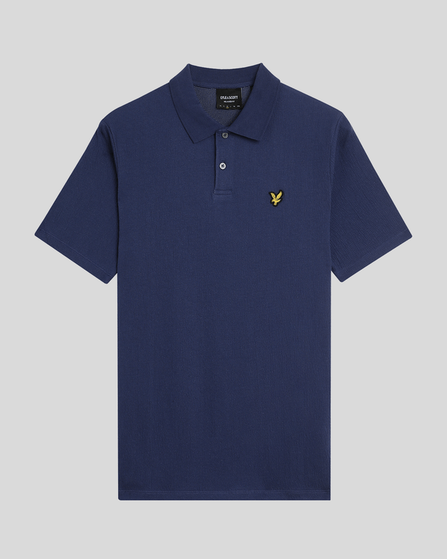 Introducing the Crepe Polo Shirt, a pinnacle of sophistication in our Spring menswear collection. This elegant piece features a refined relaxed fit and is crafted from a luxurious blend of 98% cotton and 2% elastane, ensuring ultimate comfort and mobility. Thoughtfully designed with a two-button placket and adorned with the distinctive Golden Eagle tab on the left chest, this polo exemplifies timeless style and versatility.

- Composition: 98% Cotton, 2% Elastane
- Fit: Relaxed
- Logo Branding: Golden Eagle tab
- Logo Placement: Left chest
- Versatile styling for casual and semi-formal occasions

Elevate your wardrobe with this sophisticated polo, perfect for the discerning gentleman this spring.