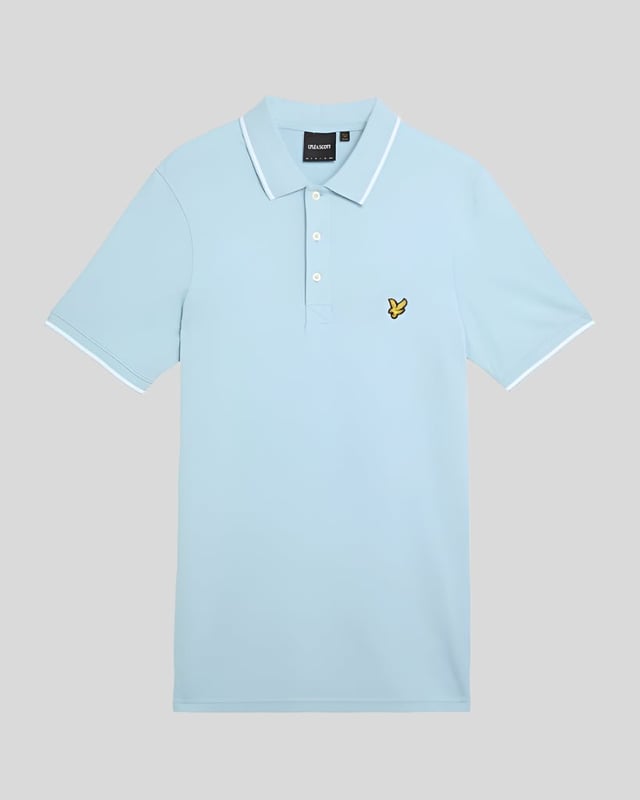 When people think of Lyle & Scott, they often think of polo shirts, so it stands to reason that we create the best polo shirts season after season. This one is cut for a classic fit in cotton jersey with a bit of added stretch and is finished with contrast tipping at the collar and cuffs for a slightly preppy look. - Classic collar 
- Front button fastening 
- Short sleeves 
- Tipped collar and cuffs
- Composition: 97% cotton, 3% elastane