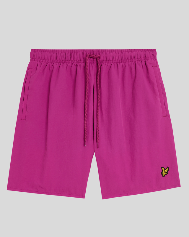 Finished with our signature Golden Eagle, these mesh-lined plain swim shorts, with fast-drying fabric, deliver the iconic Lyle & Scott style both in and out of the pool.