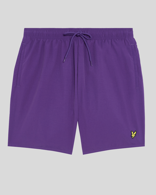 Finished with our signature Golden Eagle, these mesh-lined plain swim shorts, with fast-drying fabric, deliver the iconic Lyle & Scott style both in and out of the pool.