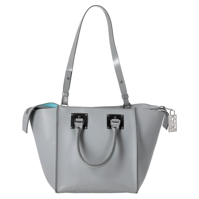 VINTAGE, RRP AS NEW
Add a touch of refined sophistication to your accessories collection with the Sophie Hulme Albion Shoulder Bag in luxurious grey leather. Known for its timeless design and impeccable craftsmanship, this bag features a structured silhouette that exudes both elegance and versatility. The soft grey leather is complemented by gold-tone hardware, creating a perfect balance of understated luxury. With its spacious interior and adjustable shoulder strap, the Albion bag offers both practicality and style, making it ideal for everyday use or special occasions. Whether paired with casual or formal outfits, this bag elevates any look with a sleek and modern finish.

 Sophie Hulme Albion Shoulder Bag in Grey Leather

Condition: Excellent
Signs of wear: No retail tag, No visible sign of wear., 
Packaging: None
Color: Grey
Material: Leather | leather
Size: One Size | One Size
Measurements: Width: 200; Height: 230; Length: 400; Handle drop: 330; Strap length: 620
SKU: TONPUDEBA451857W