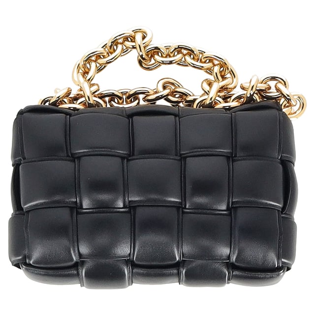 VINTAGE, RRP AS NEW
The Bottega Veneta Chain Cassette Bag in black leather is a masterclass in bold sophistication. Showcasing the house’s signature maxi Intrecciato weave, this standout piece is crafted from plush padded leather and features a chunky gold-finish chain strap that doubles as jewelry. The interior is lined with bonded lambskin and includes a single zipped pocket for essentials, while a metal closure ensures a seamless finish. Equal parts iconic and innovative.


Bottega Veneta Chain Cassette Bag in Black Leather
Condition: Excellent
Signs of wear: No retail tag, No visible sign of wear., 
Packaging: Dust bag
Color: black
Material: Leather | leather
Size: One Size | One Size
Measurements: Width: 80; Height: 180; Length: 250
SKU: NAPPUGBBA494828W