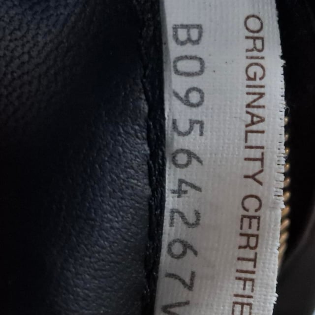 VINTAGE, RRP AS NEW
The Bottega Veneta Chain Cassette Bag in black leather is a masterclass in bold sophistication. Showcasing the house’s signature maxi Intrecciato weave, this standout piece is crafted from plush padded leather and features a chunky gold-finish chain strap that doubles as jewelry. The interior is lined with bonded lambskin and includes a single zipped pocket for essentials, while a metal closure ensures a seamless finish. Equal parts iconic and innovative.


Bottega Veneta Chain Cassette Bag in Black Leather
Condition: Excellent
Signs of wear: No retail tag, No visible sign of wear., 
Packaging: Dust bag
Color: black
Material: Leather | leather
Size: One Size | One Size
Measurements: Width: 80; Height: 180; Length: 250
SKU: NAPPUGBBA494828W