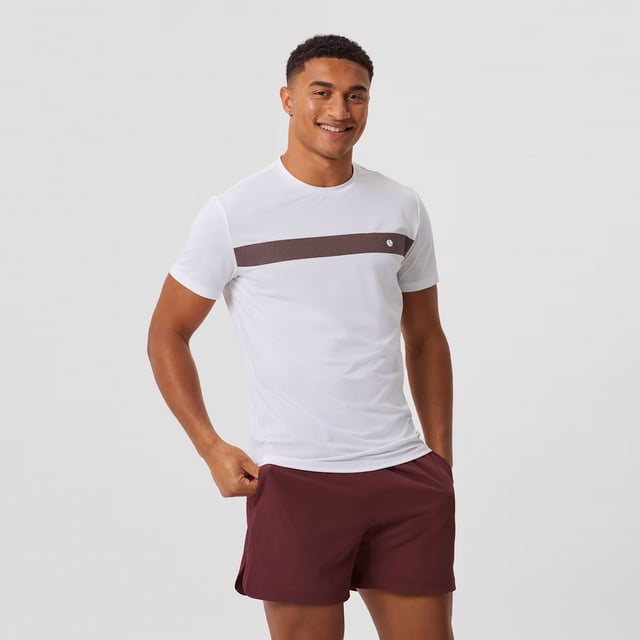 Ace Light T-shirt - Performance and Comfort in Motion: Upgrade your athletic wear with the Björn Borg Ace Light T-shirt, crafted for those who prioritize performance and comfort. Made from soft, recycled polyester, this lightweight tee offers a regular fit and enhanced breathability, making it perfect for high-energy activities. Its classic design is complemented by a ribbed round neck and the iconic Borg logo on the chest. Extra Product Details:. 100% Recycled Polyester Regular Fit Breathable Fabric Ribbed Round Neck Machine Washable. This T-shirt is the perfect combination of style, comfort, and sustainability, ideal for any workout routine.