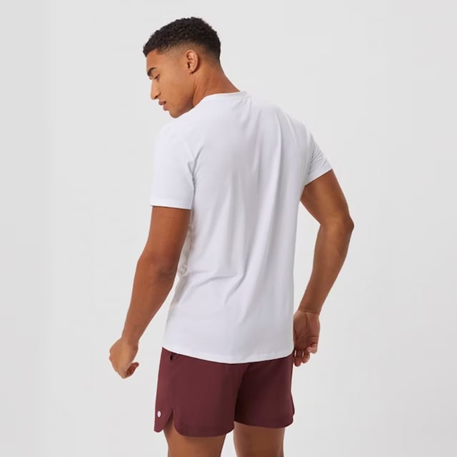 Ace Light T-shirt - Performance and Comfort in Motion: Upgrade your athletic wear with the Björn Borg Ace Light T-shirt, crafted for those who prioritize performance and comfort. Made from soft, recycled polyester, this lightweight tee offers a regular fit and enhanced breathability, making it perfect for high-energy activities. Its classic design is complemented by a ribbed round neck and the iconic Borg logo on the chest. Extra Product Details:. 100% Recycled Polyester Regular Fit Breathable Fabric Ribbed Round Neck Machine Washable. This T-shirt is the perfect combination of style, comfort, and sustainability, ideal for any workout routine.