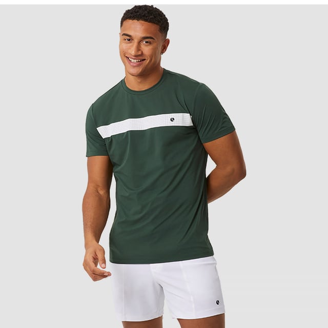 Ace Light T-shirt - Performance and Comfort in Motion: Upgrade your athletic wear with the Björn Borg Ace Light T-shirt, crafted for those who prioritize performance and comfort. Made from soft, recycled polyester, this lightweight tee offers a regular fit and enhanced breathability, making it perfect for high-energy activities. Its classic design is complemented by a ribbed round neck and the iconic Borg logo on the chest. Extra Product Details:. 100% Recycled Polyester Regular Fit Breathable Fabric Ribbed Round Neck Machine Washable. This T-shirt is the perfect combination of style, comfort, and sustainability, ideal for any workout routine.