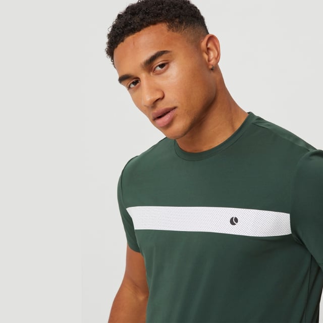 Ace Light T-shirt - Performance and Comfort in Motion: Upgrade your athletic wear with the Björn Borg Ace Light T-shirt, crafted for those who prioritize performance and comfort. Made from soft, recycled polyester, this lightweight tee offers a regular fit and enhanced breathability, making it perfect for high-energy activities. Its classic design is complemented by a ribbed round neck and the iconic Borg logo on the chest. Extra Product Details:. 100% Recycled Polyester Regular Fit Breathable Fabric Ribbed Round Neck Machine Washable. This T-shirt is the perfect combination of style, comfort, and sustainability, ideal for any workout routine.
