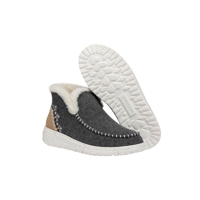 Faux shearling just hits different. Like, omg-these-are-cozier-than-my-slippers different. But hey, that's how the Denny Wool Faux Shearling bootie rolls. Heavy on style with plush wool and suede uppers.