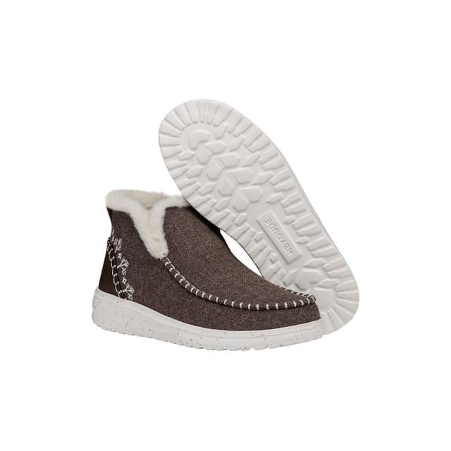 Faux shearling just hits different. Like, omg-these-are-cozier-than-my-slippers different. But hey, that's how the Denny Wool Faux Shearling bootie rolls. Heavy on style with plush wool and suede uppers.