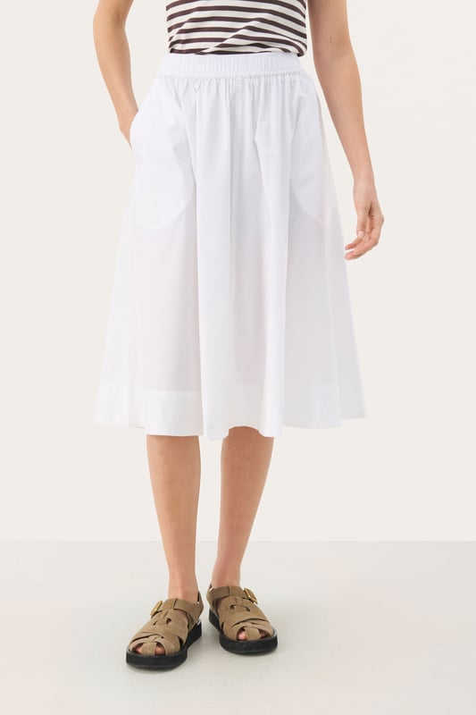 A-shape,Elastische Taille,Knielänge  Schonwäsche 30°, Nicht bleichen, Nicht im Trockner trocknen, Tropnass aufhängen im Schatten, Warm bügeln max. 150° C, Nicht trockenreinigen  100% Baumwolle (Organisch)
