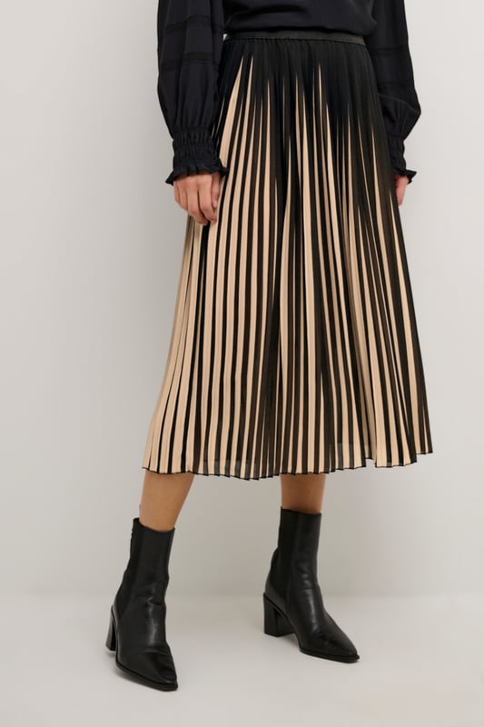 Relaxed fit,Elastische Taille,Midi-Länge  Schonwäsche 30°, Nicht bleichen, Nicht im Trockner trocknen, Tropnass aufhängen, Kalt bügeln max. 110° C, Nicht trockenreinigen  100% Polyester