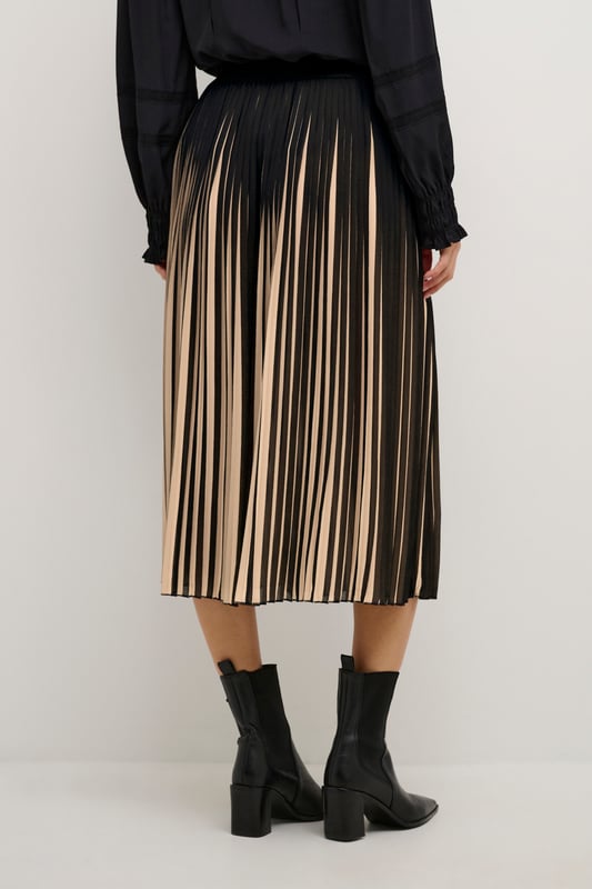 Relaxed fit,Elastische Taille,Midi-Länge  Schonwäsche 30°, Nicht bleichen, Nicht im Trockner trocknen, Tropnass aufhängen, Kalt bügeln max. 110° C, Nicht trockenreinigen  100% Polyester