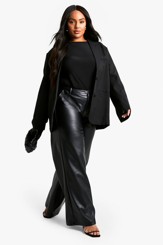 Oversized fit for a relaxed and contemporary silhouette
        Single-breasted design with notched lapels
        Long sleeves with button cuffs for a polished finish
        Front button closure for easy wear
        Versatile plus-size option suitable for various occasions
    
    Make a bold statement with this oversized blazer, perfect for the fashion-forward woman who loves to stay on-trend. The relaxed fit offers comfort without compromising on style, making it an ideal choice for both casual outings and semi-formal events. Pair it with wide-leg trousers and a simple top for a chic office look, or throw it over a bodycon dress for a night out with the girls. The single-breasted design and notched lapels add a touch of classic tailoring to this contemporary piece. Whether you're heading to a family gathering or a casual lunch date, this blazer will effortlessly elevate your ensemble. Its versatility allows for endless styling options - belt it for a more defined silhouette or leave it open for a laid-back vibe. This Boohoo blazer is your go-to piece for creating looks that radiate confidence and style.